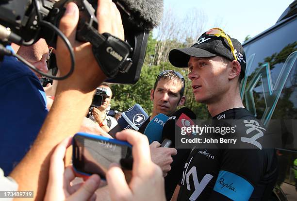 Christopher Froome of Great Britain and Team Sky Procycling answers questions from journalists during the second rest day of the 2013 Tour de France...