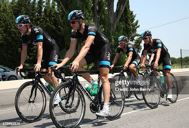 Geraint Thomas of Great Britain and Team Sky Procycling along teammates Ian Stannard of Great Britain, Richie Porte of Australia, Peter Kennaugh of...