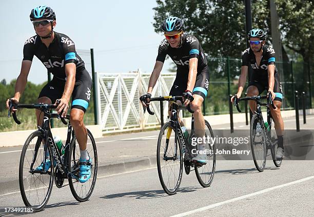 Christopher Froome of Great Britain and Team Sky Procycling rides with his teammates during the second rest day of the 2013 Tour de France on July...