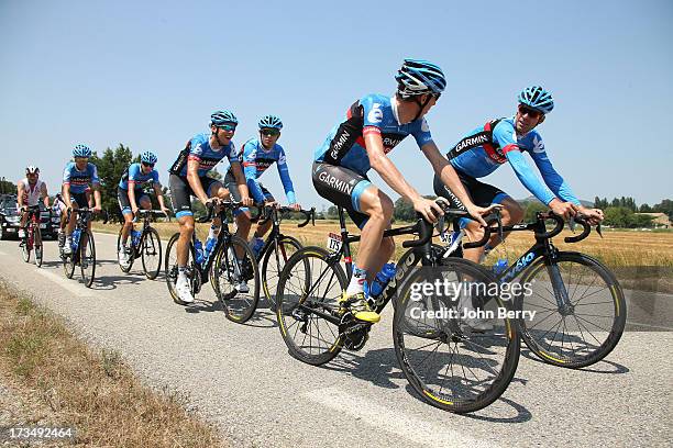 Daniel Martin of Ireland and Team Garmin-Sharp and David Millar of Great Britain lead their teammates during the second rest day of the 2013 Tour de...