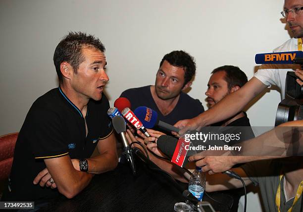 Thomas Voeckler of France and Team Europcar answers questions from journalists during the second rest day of the 2013 Tour de France on July 15, 2013...