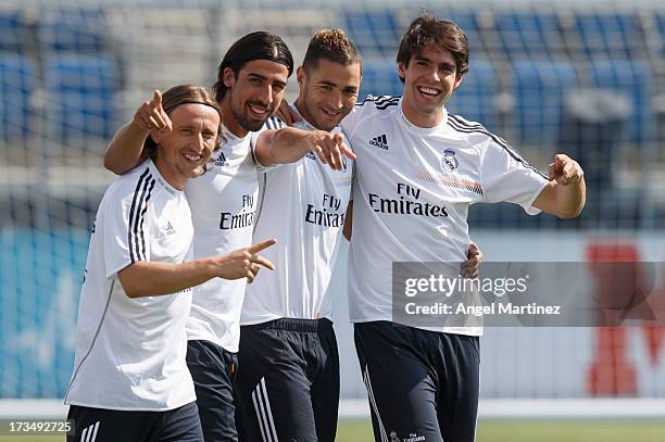 Luka Modric, Sami Khedira, Karim Benzema and Kaka of Real Madrid pose for a photo during a training session at Valdebebas training ground on July 15,...