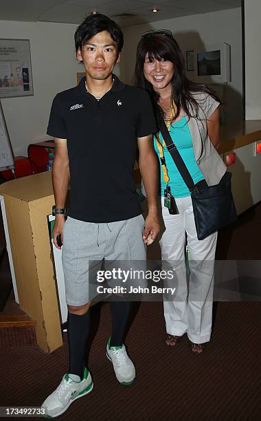Yukiya Arashiro of Japan and Team Europcar and his wife Iijima Miwa pose at his hotel during the second rest day of the 2013 Tour de France on July...