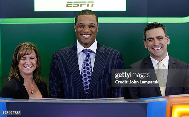 Lisa Grutta from Chevrolet , MLB All-Star Yankees Robinson Cano and Major League VP Dan Derian, ring the opening bell at NASDAQ MarketSite on July...