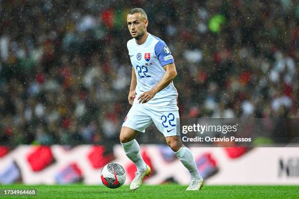 Stanislav Lobotka of Slovakia in action during the UEFA EURO 2024 European qualifier match between Portugal and Slovakia at Estadio do Dragao on...