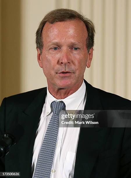 Neil Bush speaks during an event in the East Room during an event at the White House, July 15, 2013 in Washington, DC. President Barack Obama hosted...