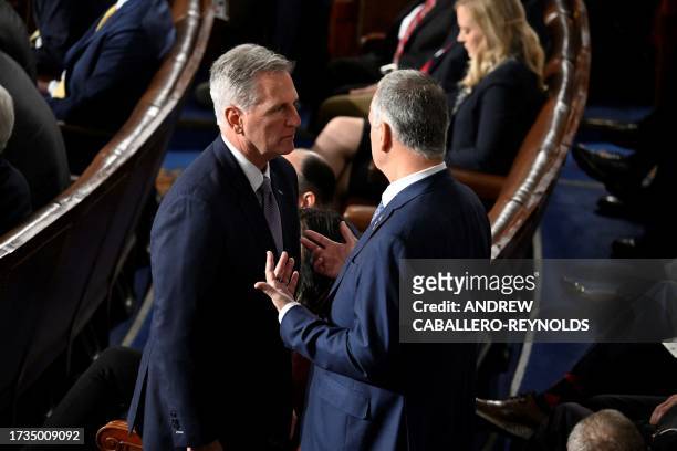 Former House Speaker Kevin McCarthy, Republican of California, speaks with a colleague during a third round of voting to elect a new speaker after...