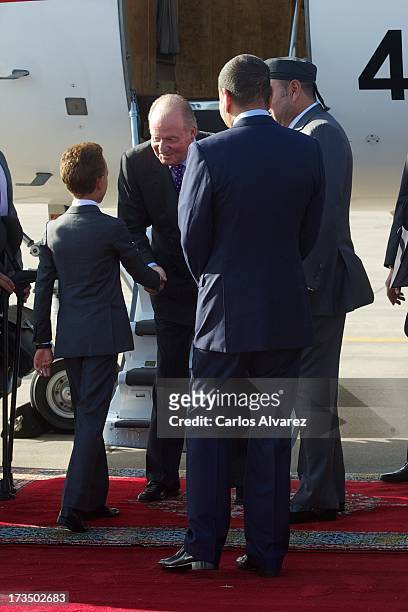 King Mohammed VI of Morocco , his son and Crown Prince Moulay El Hassan and King's brother Prince Moulay Rachid receive King Juan Carlos of Spain at...