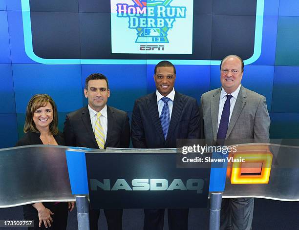 Lisa Grutta from Chevrolet, Major League VP Dan Derian, MLB All-Star Yankees Robinson Cano and David Wicks ring the opening bell at NASDAQ MarketSite...