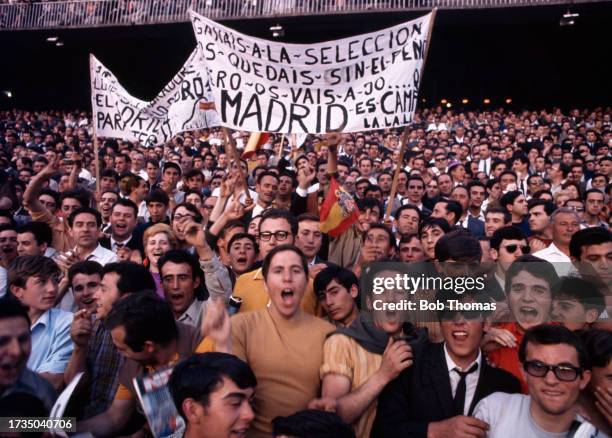 Real Madrid fans supporting their team during the European Cup Semi-final 2nd leg between Real Madrid and Manchester United at the Santiago Bernabeu...