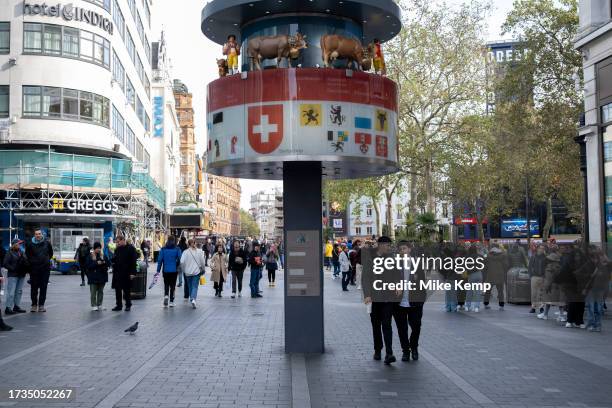 Swiss glockenspiel clock in Leicester Square on 16th October 2023 in London, United Kingdom. Leicester Square is a pedestrianised square in the West...