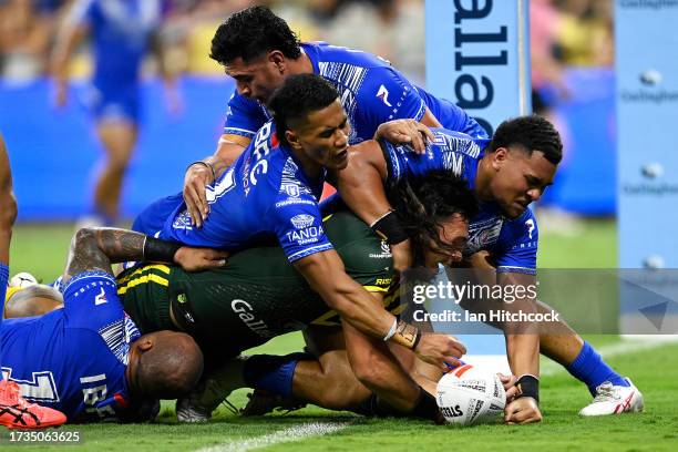 Tino Fa’asuamaleaui of the Kangaroos scores a try during the Mens Pacific Championship match between Australia Kangaroos and Samoa at Queensland...