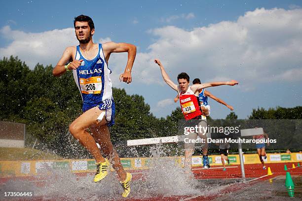 Themistoklis Evangelos Milas of Greece and Marc Bill of Switzerland compete in the 2000m Boys steeple race during the European Youth Olympic Festival...