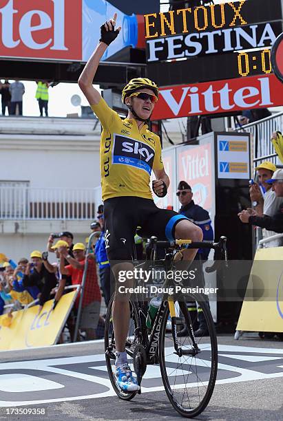 Chris Froome of Great Britain riding for Sky Procycling wearing the overall race leader's yellow jersey celebrates his victory in stage fifteen of...