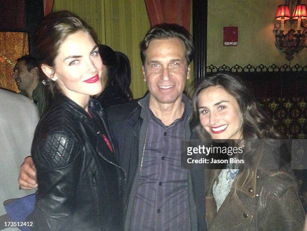 Model Hilary Rhoda, Dr. Richard Firshein and guest pose circa May 2013 in New York City.