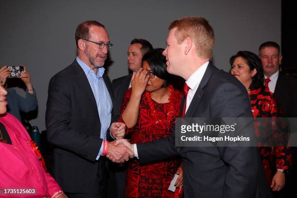 New Zealand Prime Minister and Labour leader Chris Hipkins shakes hands with liduring a Labour Party election night event at Lower Hutt Events Centre...