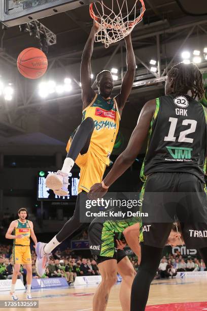 Majok Deng of the JackJumpers dunks during the round three NBL match between South East Melbourne Phoenix and Tasmania JackJumpers at John Cain...