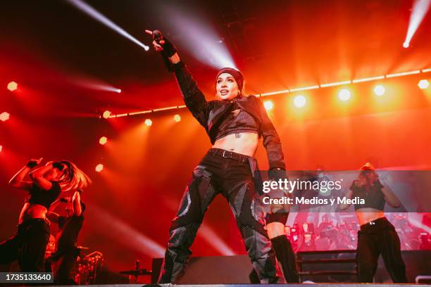 Argentinian singer María Becerra performs during a concert as part of the 'Mexico Tour' at Auditorio Citibanamex on October 13, 2023 in Monterrey,...