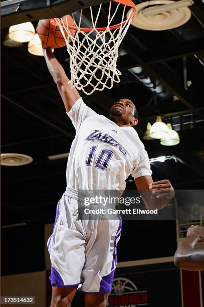 Michael Snaer of the Los Angeles Lakers goes up for the dunk against the Los Angeles Clippers during NBA Summer League on July 15, 2013 at the Cox...