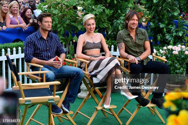 Ryan Seacrest, Miley Cyrus and Keith Urban visit ABC's "Good Morning America" on July 15, 2013 in New York, United States.