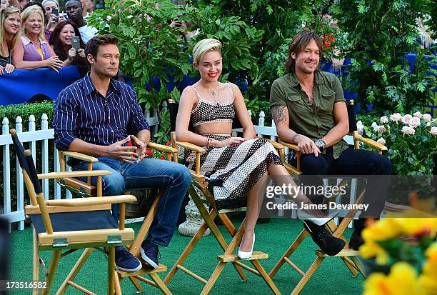 Ryan Seacrest, Miley Cyrus and Keith Urban visit ABC's "Good Morning America" on July 15, 2013 in New York, United States.