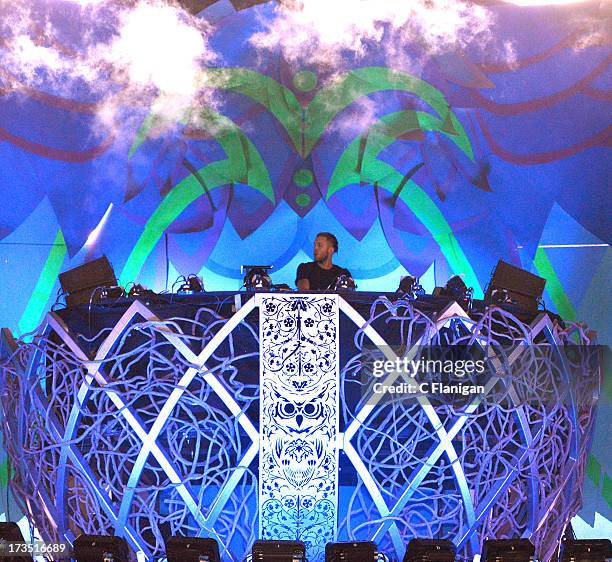 Producer Calvin Harris performs onstage during the 17th Annual Electric Daisy Carnival at Las Vegas Motor Speedway on June 23, 2013 in Las Vegas,...