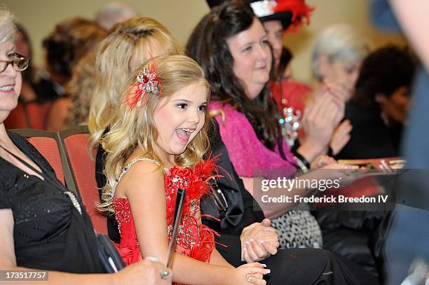 Eden Wood reacts after being announced as the winner of the Entertainer of the Year Award at the First Annual Youth Excellence Awards at Holiday Inn...