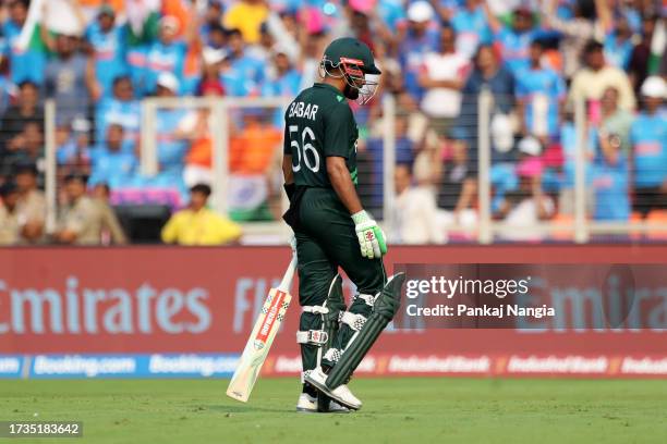 Babar Azam of Pakistan leaves the field after being bowled out by Mohammed Siraj of India during the ICC Men's Cricket World Cup India 2023 between...