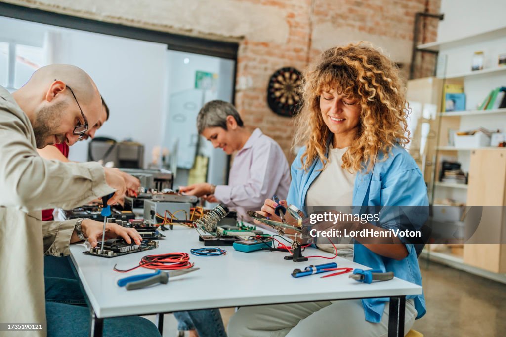 Computer Technians Group Of Technicians Restoring Computer Components High-Res Stock Photo ...