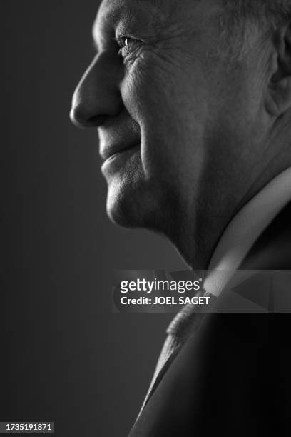 President of the French Constitutional Council Laurent Fabius, poses in his office during a photo session in Paris on October 19, 2023