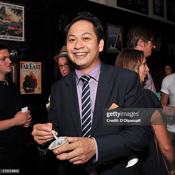 Producer Peter Phok eats Ample Hills Creamery ice cream during the Glass Eye Pix "Beneath" Premiere Event - After Party at Oliver's City Tavern on...