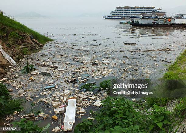 General view of floating garbage on Yangtze River in the upper reaches of Three Gorges Dam on July 15, 2013 in Yichang, Hubei Province of China....