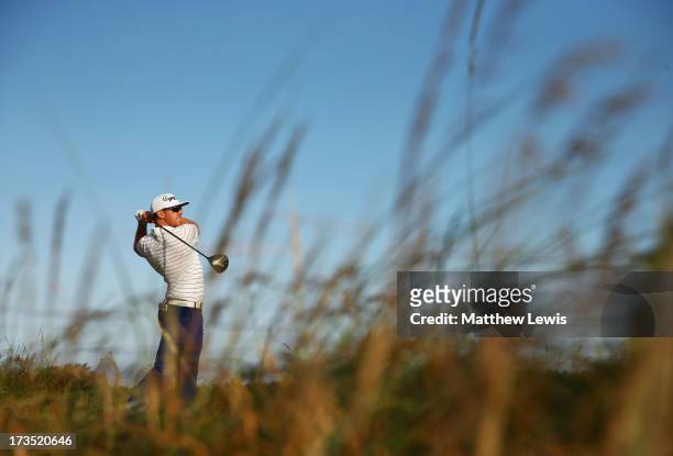 Hunter Mahan of the United States tees off on the 5th ahead of the 142nd Open Championship at Muirfield on July 16, 2013 in Gullane, Scotland.
