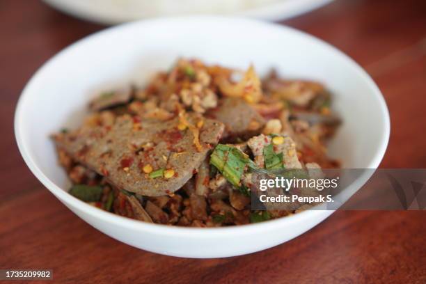 spicy minced chicken with pork liver salad - pork liver stock pictures, royalty-free photos & images