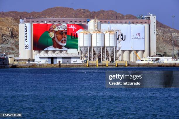 port sultan qaboos - grain and cement silos, muttrah, muscat, oman - qaboos bin said al said stock pictures, royalty-free photos & images