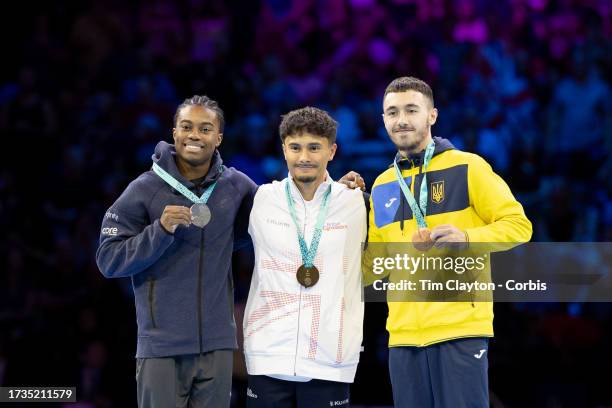 October 08: Khoi Young of the United States with his silver medal, Jake Jarman of Great Britain with his gold medal and Nazar Chepurnyi of Ukraine...