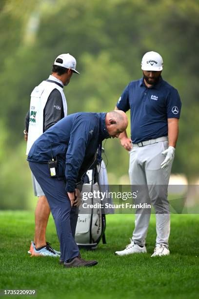 World Tour Referee Simon Higginbottom gives a ruling to Jon Rahm of Spain on the fourth hole on Day Three of the acciona Open de Espana presented by...