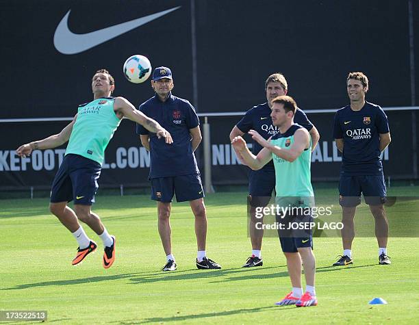 Barcelona's coach Tito Vilanova takes part in the first training session of the season at the Sports Center FC Barcelona Joan Gamper in Sant Joan...