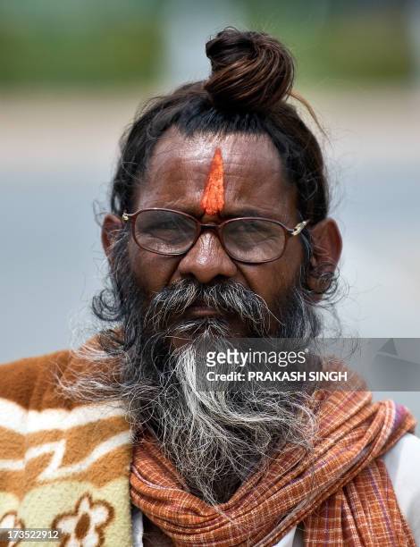 158 Indian Man With Long Hair Photos and Premium High Res Pictures - Getty  Images