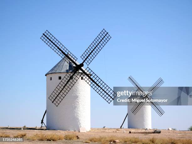 old windmill - campo de criptana stockfoto's en -beelden