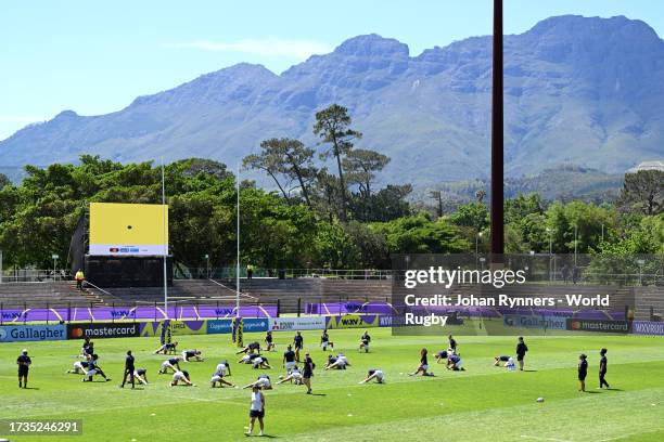 Players of United States warm up prior to the WXV 2 Match between United States and Samoa at The Danie Craven Stadium on October 14, 2023 in...