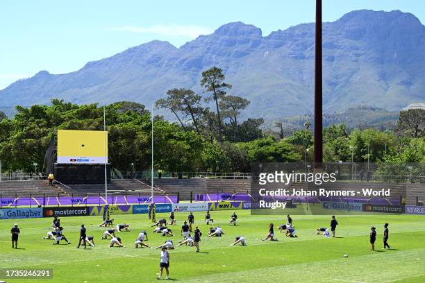 Players of United States warm up prior to the WXV 2 Match between United States and Samoa at The Danie Craven Stadium on October 14, 2023 in...