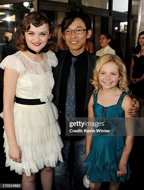 Actress Joey King, director James Wan and actress Kyla Deaver arrive at the premiere of Warner Bros. "The Conjuring" at the Cinerama Dome on July 15,...