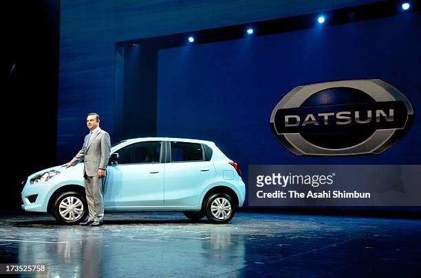 Nissan Motor Co CEO Carlos Ghosn introduces 'GO', under 'Datsun' brand on July 15, 2013 in Gurgaon, India. Nissan will launch the five-door hatchback...
