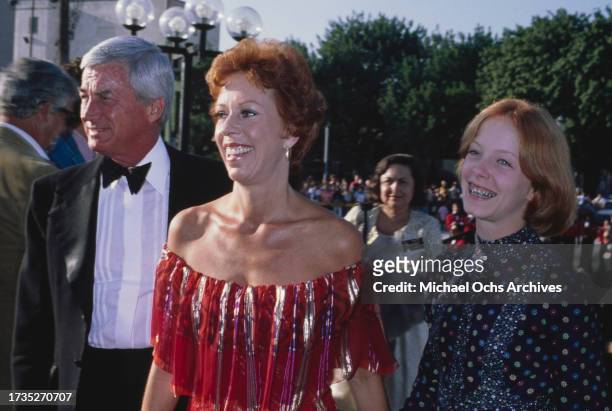 American television producer Joe Hamilton, wearing a tuxedo and bow tie, with his wife, American comedian, actress and singer Carol Burnett, wearing...
