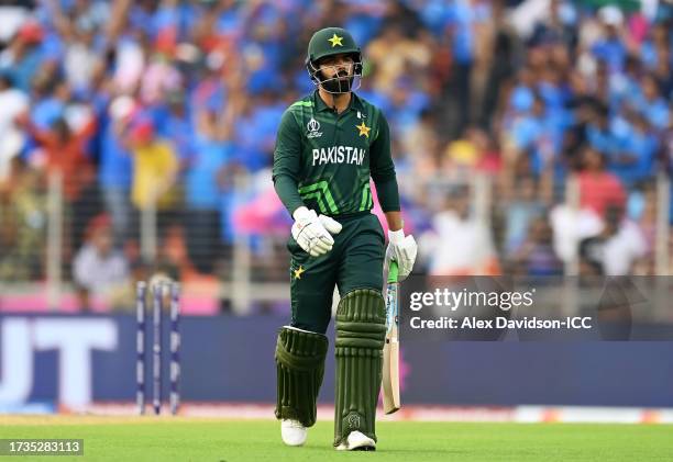Shadab Khan of Pakistan walks off after being dismissed during the ICC Men's Cricket World Cup India 2023 between India and Pakistan at Narendra Modi...