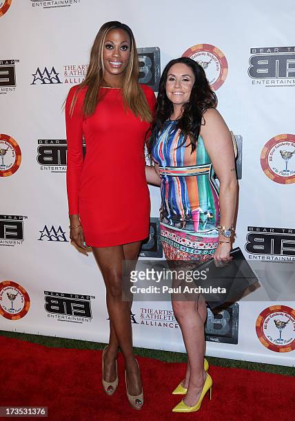 Professional Athletes Kim Glass and Lindsey Berg attend the 8th annual BTE All-Star Celebrity Kickoff Party at The Playboy Mansion on July 15, 2013...
