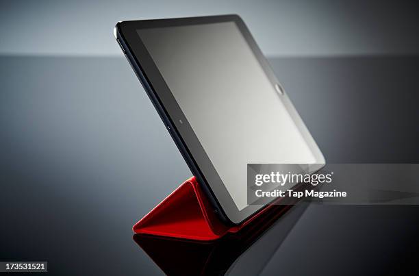 An Apple iPad Mini tablet computer fitted with a Smart Cover photographed during a studio shoot for Tap Magazine, January 3, 2013.