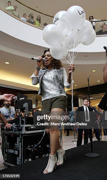 Dinah-Jane Hansen of Fifth Harmony performs at the Square One Mall on July 15, 2013 in Saugus, Massachusetts.