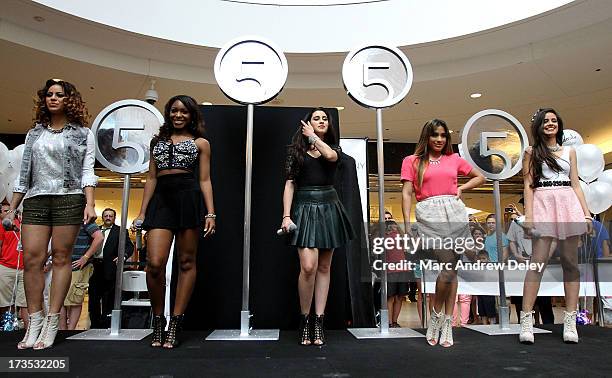 Dinah-Jane Hansen, Normani Hamilton, Lauren Jauregui, Ally Brooke and Camila Cabello of Fifth Harmony perform at the Square One Mall on July 15, 2013...